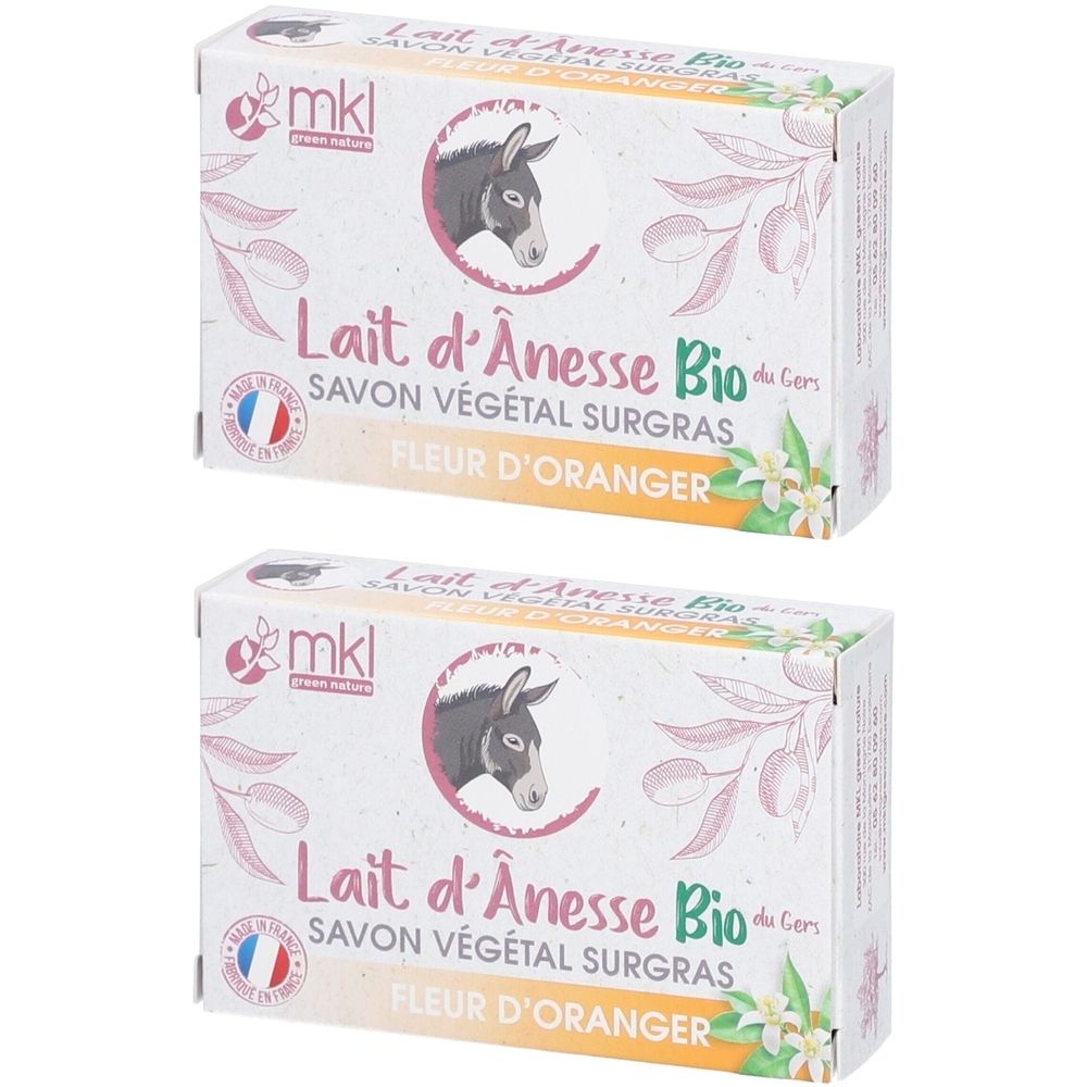 Deux boîtes de savon. Inscription : Lait d'Anesse Bio, Savon Végétal Surgras, Fleur d'Oranger. Logo : tête d'âne dans un cercle.