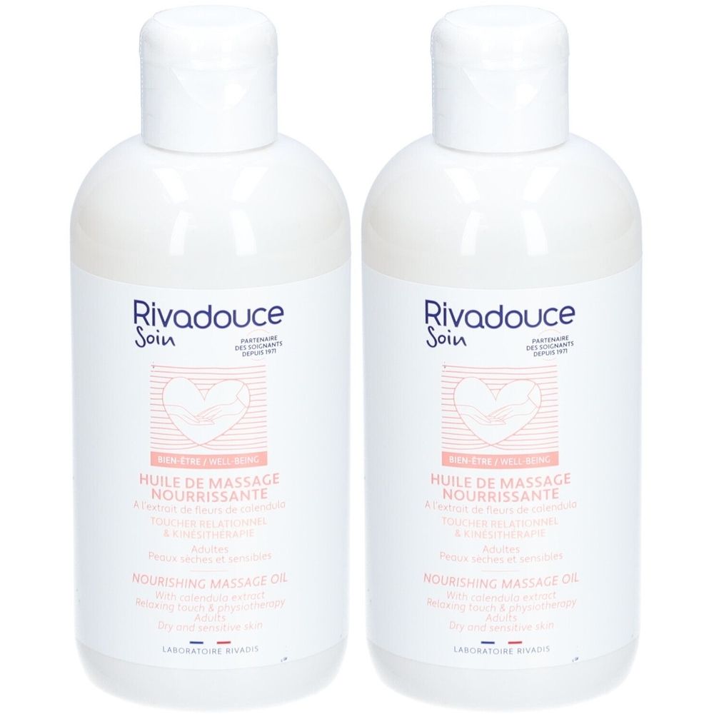 Deux flacons blancs Rivadouce Soin Huile de Massage Nourrissante. Bouchon à clapet. Inscription en français et anglais.