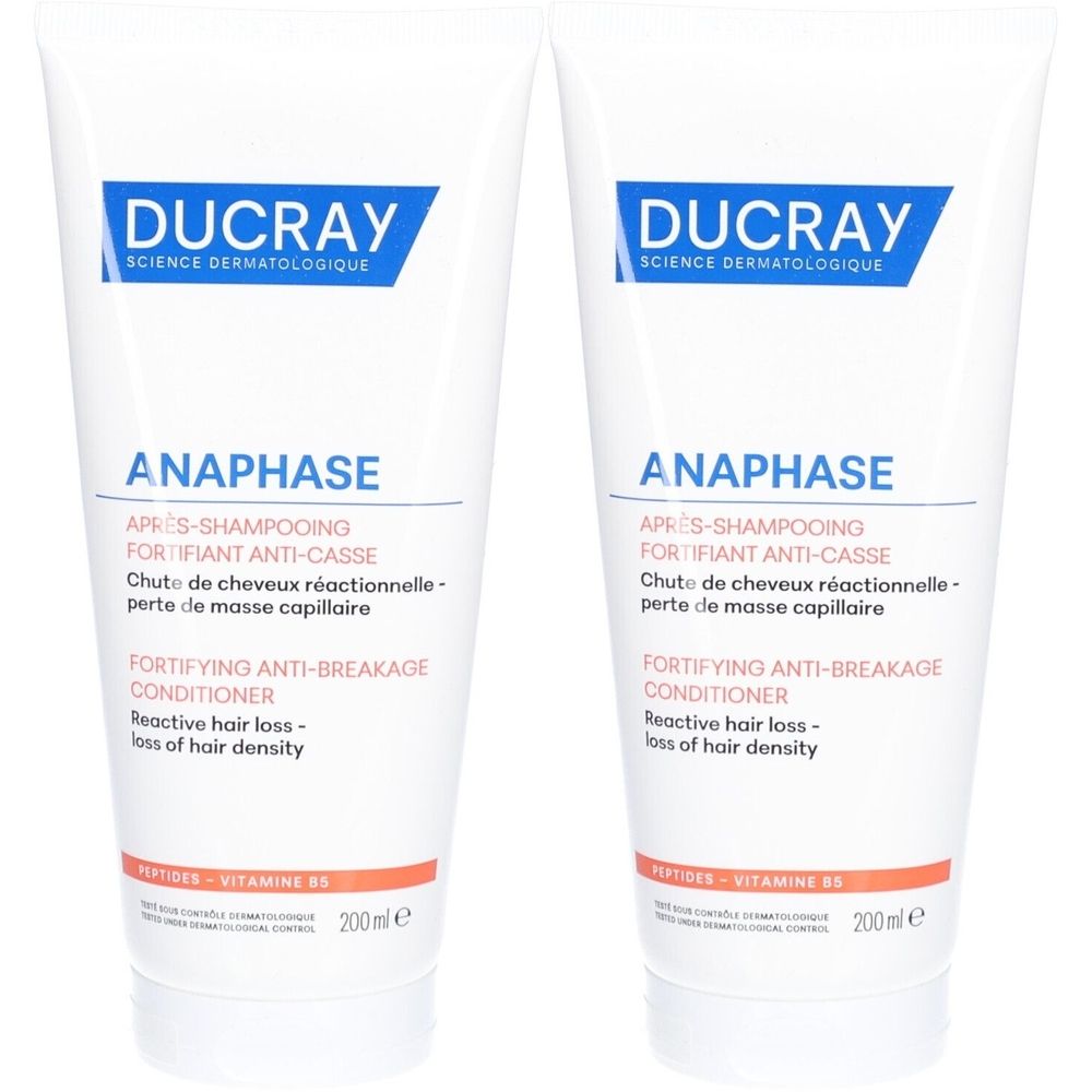 Deux tubes blancs avec inscriptions bleues et rouges. Inscription: DUCRAY ANAPHASE Après-shampoing fortifiant.