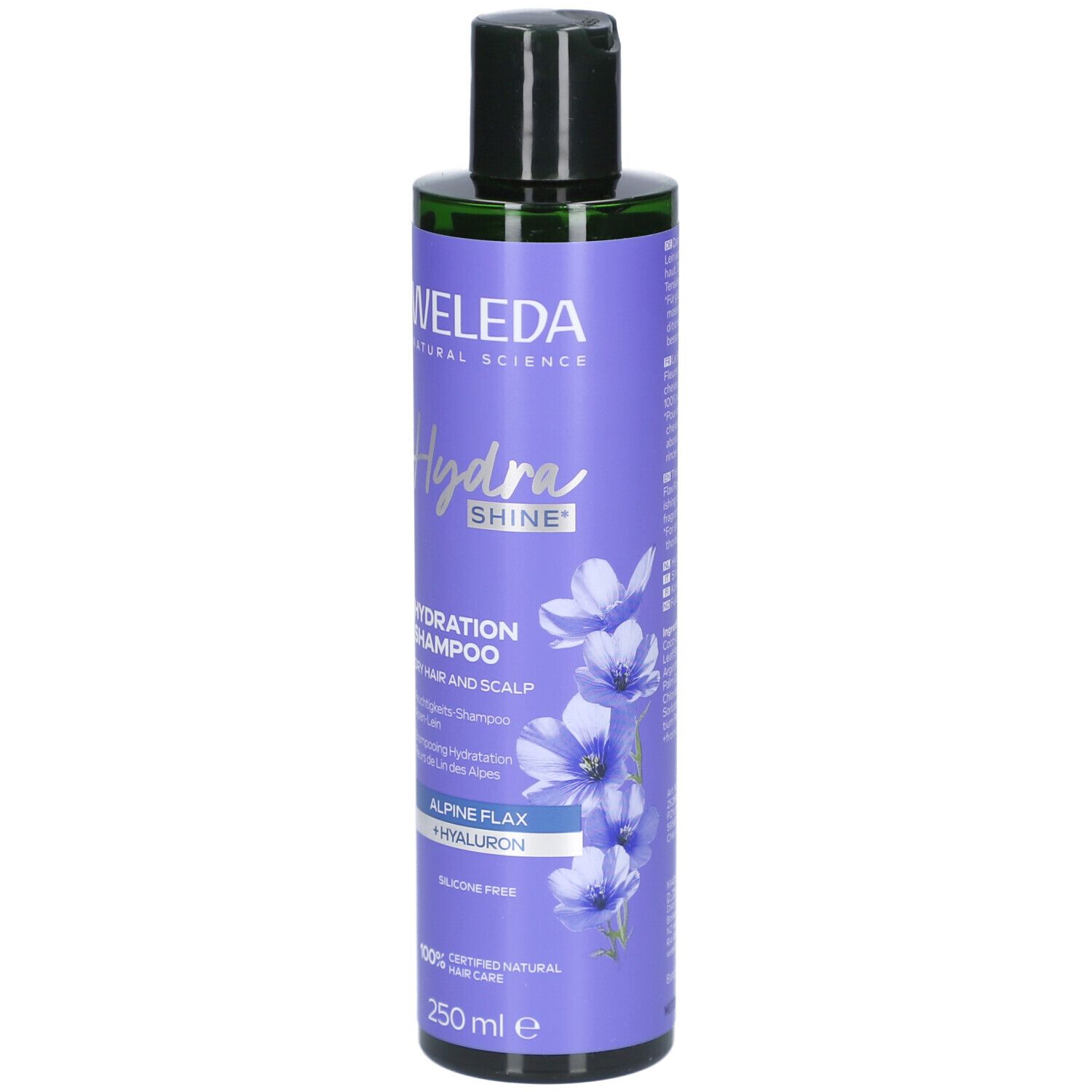 Flacon de shampooing violet avec bouchon noir. Inscription: WELEDA Hydra Shine Shampooing Hydratation. Avec lin alpin et hyaluron.