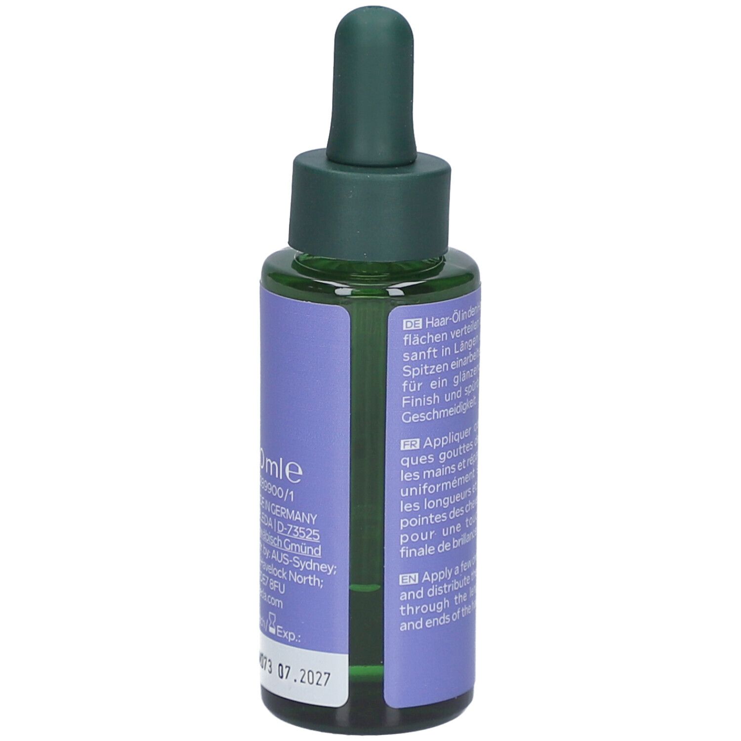 Dos du flacon avec texte. WELEDA Hydra Shine, Gloss Drops Hair Oil. Informations sur les ingrédients et la durabilité.