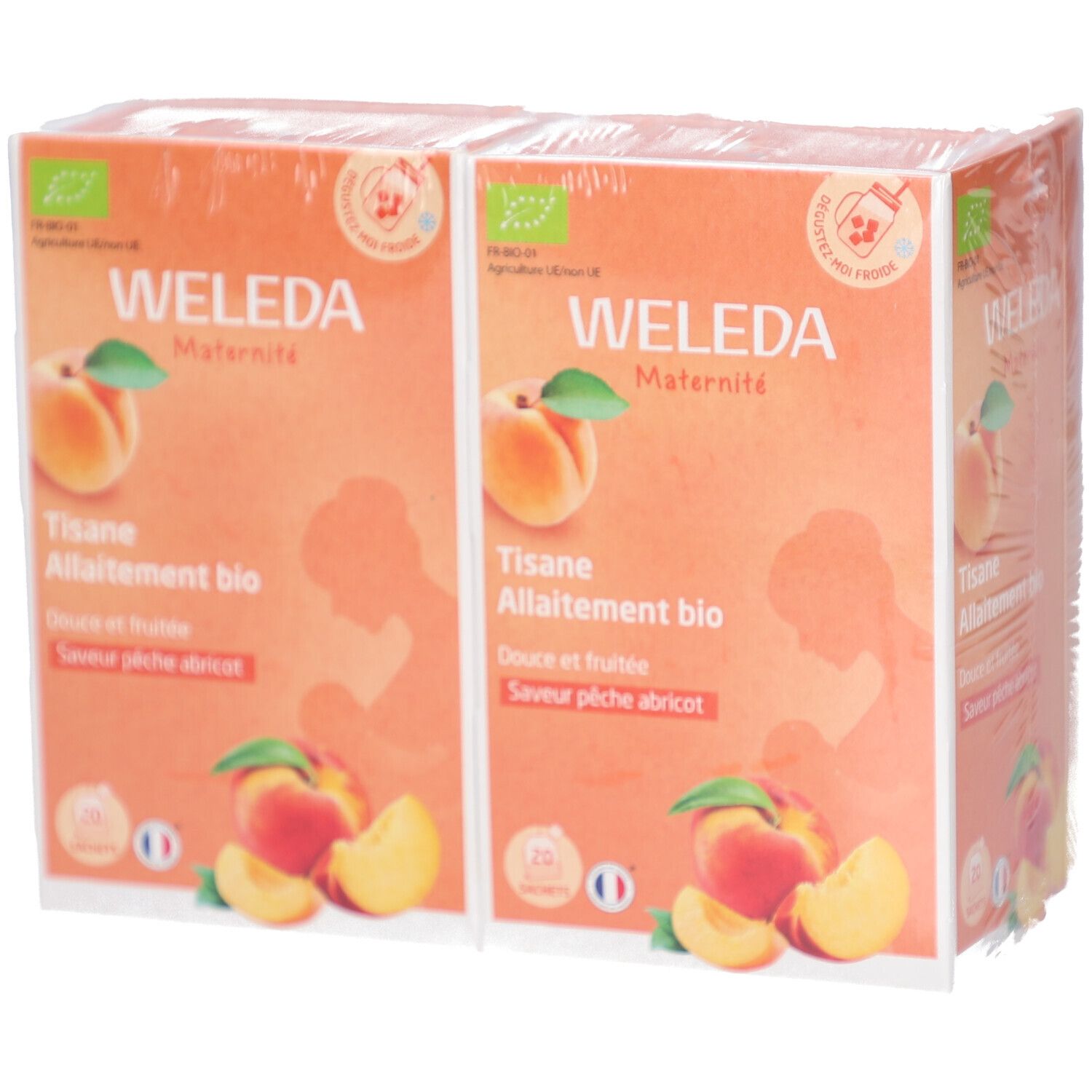 Deux boîtes de thé WELEDA emballées. Inscription : Tisane Allaitement bio, Douce et fruitée, Saveur pêche abricot. Label bio, illustration de pêches.