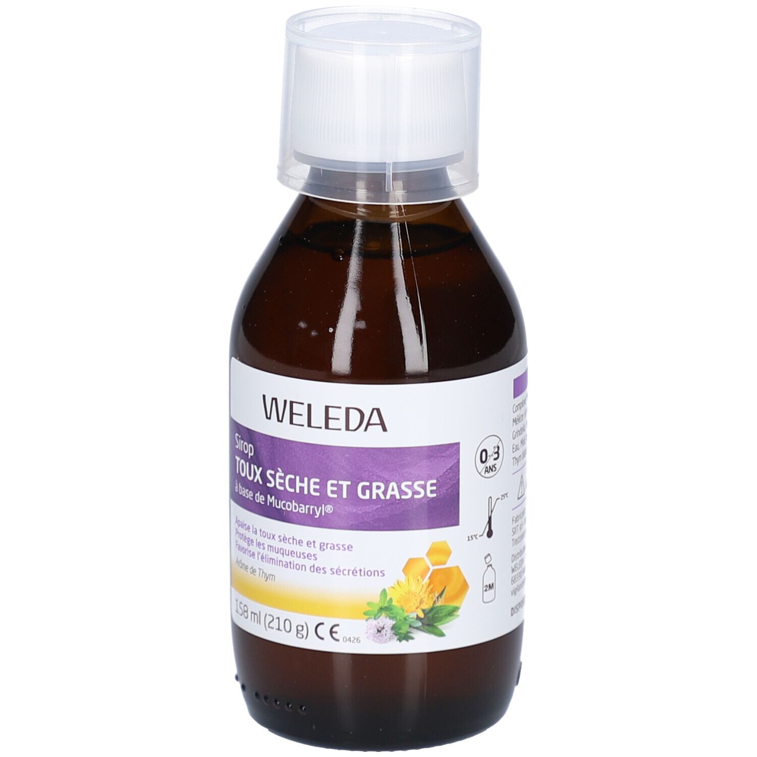 Flacon en verre brun avec bouchon blanc. Étiquette avec informations produit. Marque : Weleda. Produit : Sirop toux sèche et grasse.