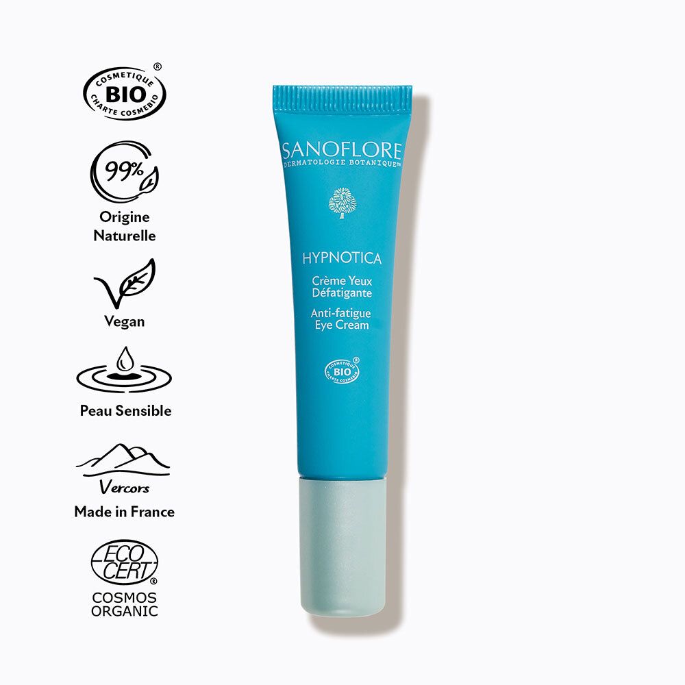 Tube de crème pour les yeux avec logos. Inscription: Sanoflore, Hypnotica, Crème Yeux Défatigante, Anti-fatigue Eye Cream. Bio, Vegan, etc.