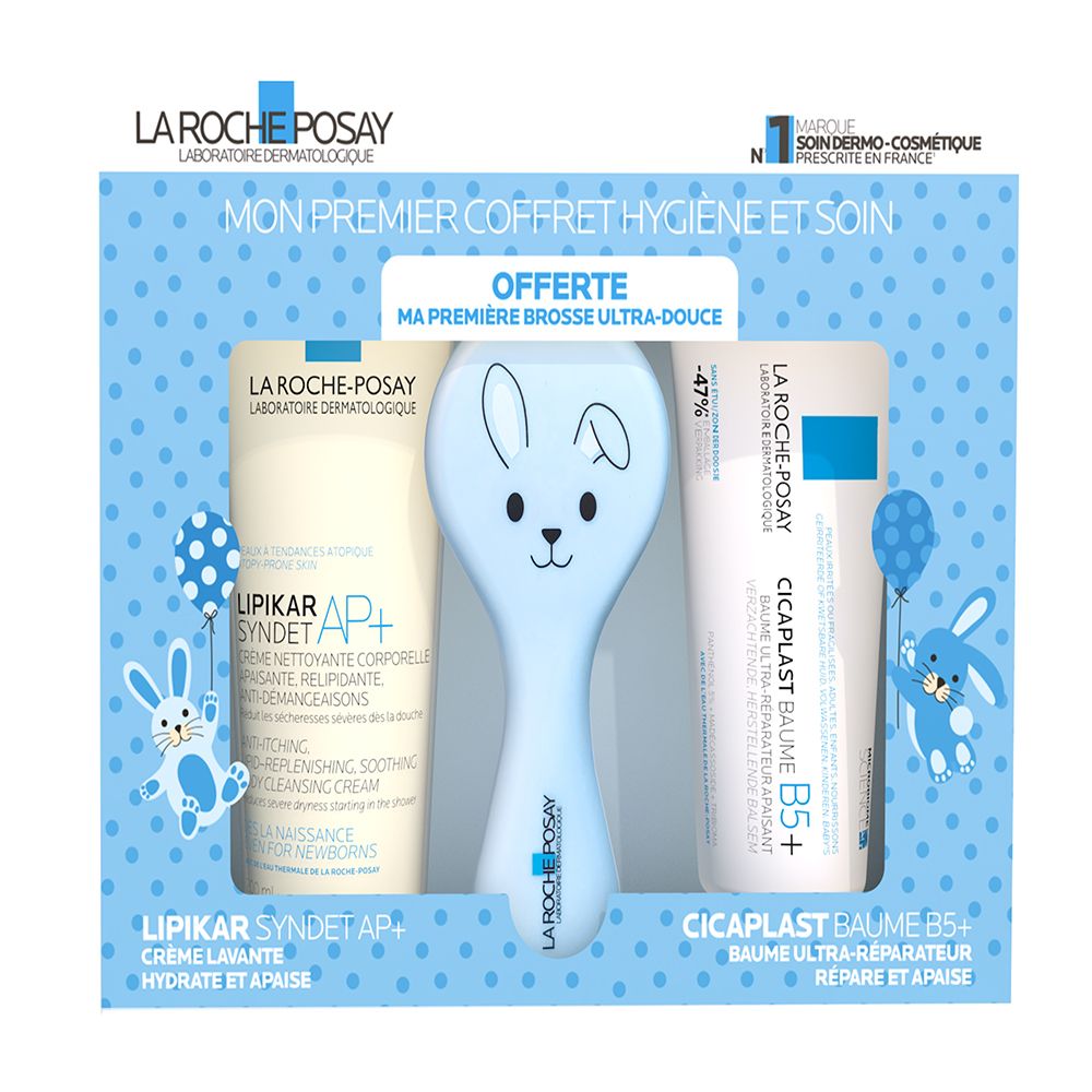 Coffret cadeau avec gel lavant, brosse et baume. Emballage bleu avec noms de produits et logo.
