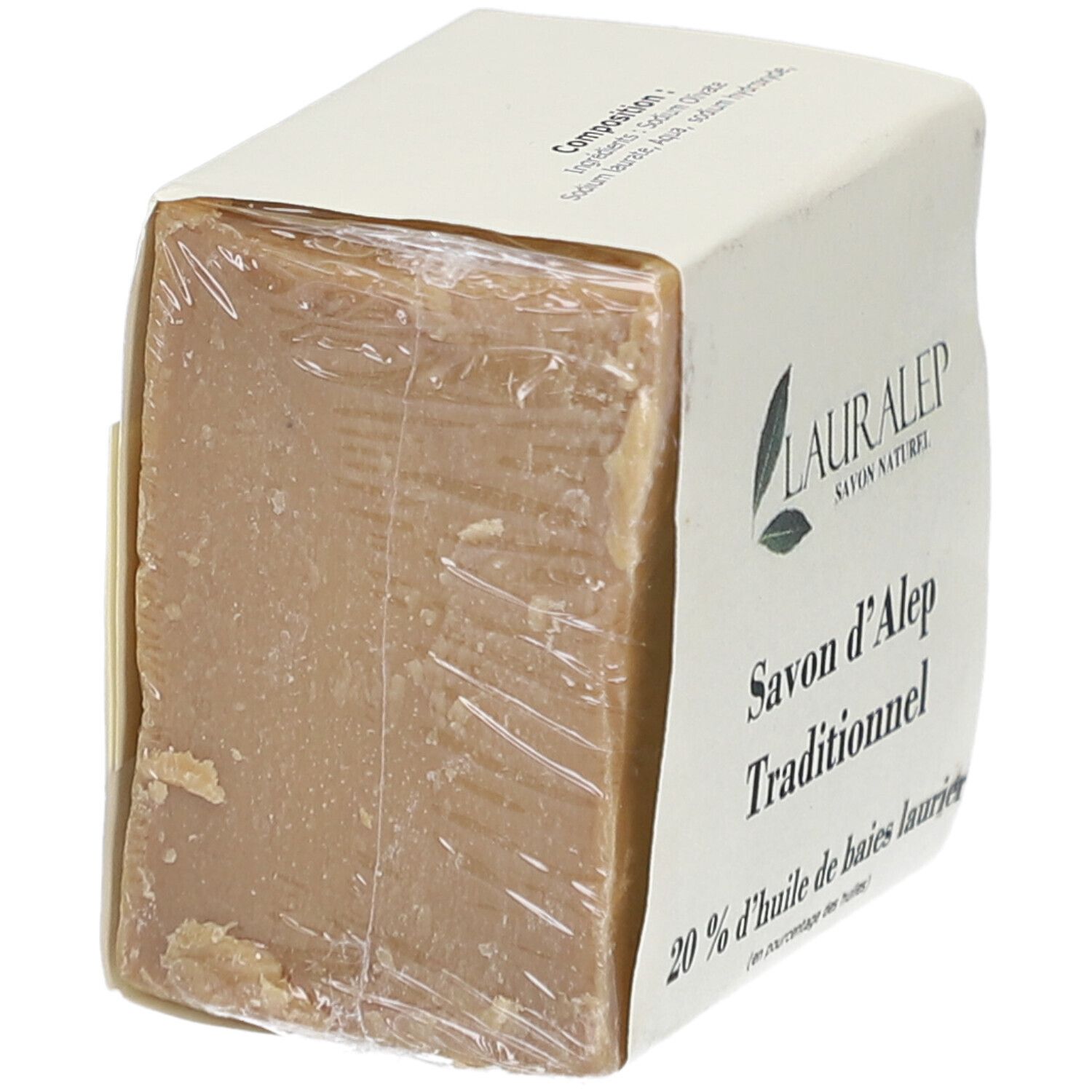 Bloc de savon carré, emballé dans du papier et du film plastique. Inscription : LAURALEP, Savon d'Alep Traditionnel, 20% huile de baies laurier.