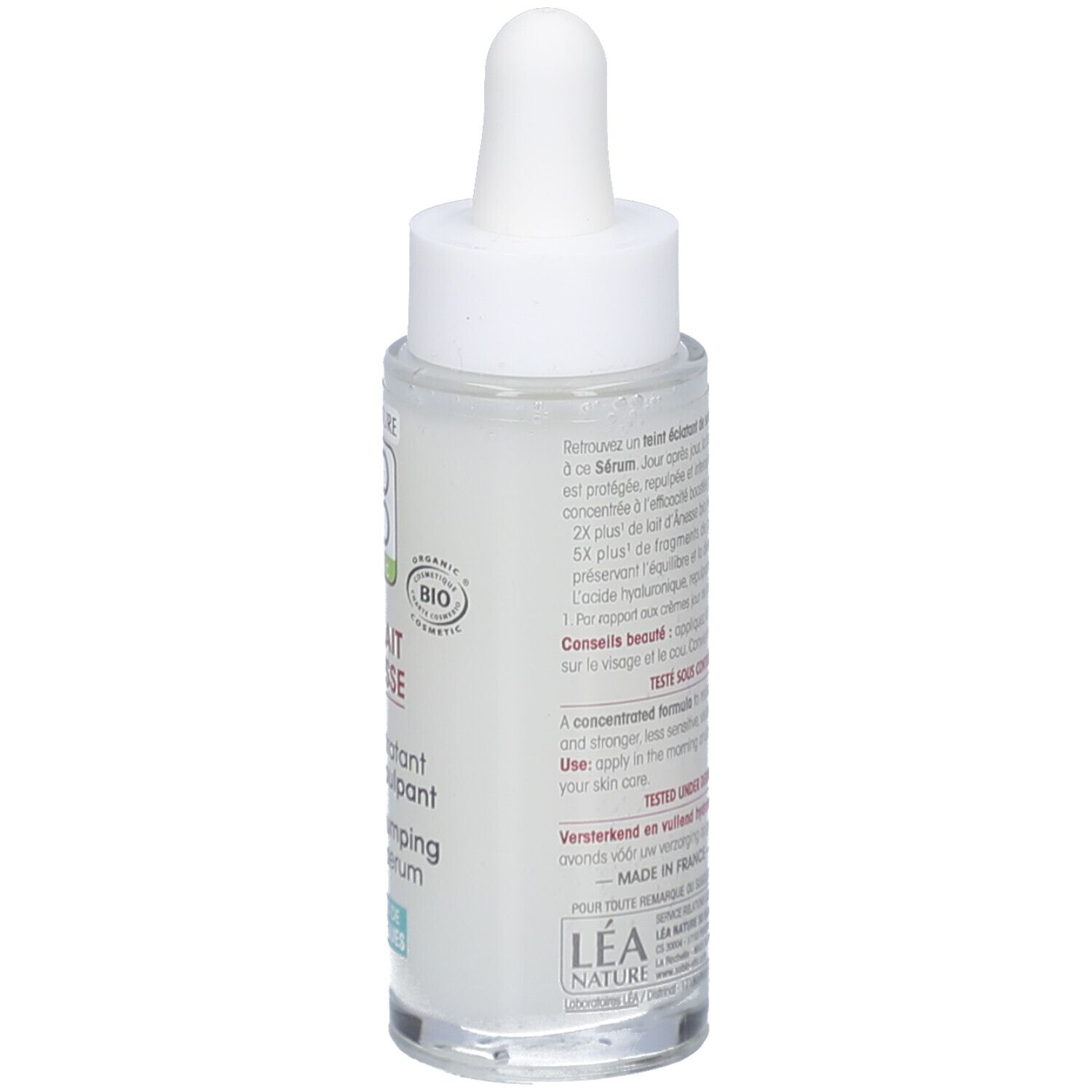 Vue arrière du flacon. Texte sur l'étiquette. Nom du produit et ingrédients. Informations du fabricant.