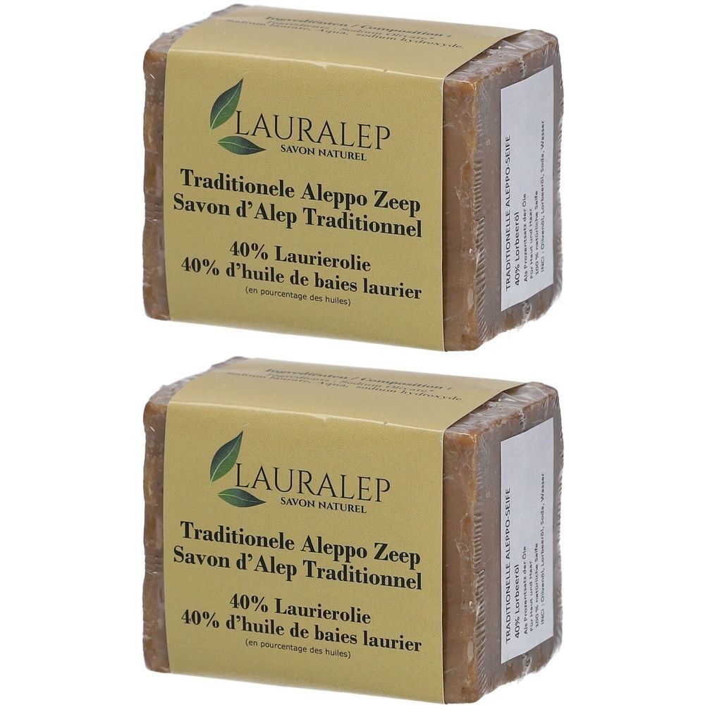 Deux savons LAURALEP, emballés. Inscription: Savon d'Alep Traditionnel, 40% huile de baies laurier. Savon brun.