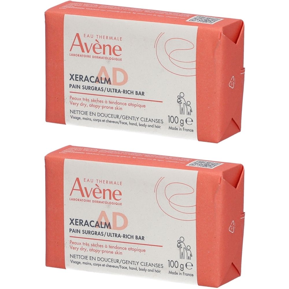 Deux pains de savon rectangulaires emballés en rose. Inscription: Avène, XeraCalm AD, Pain Surgras/Ultra-Rich Bar. 100g.