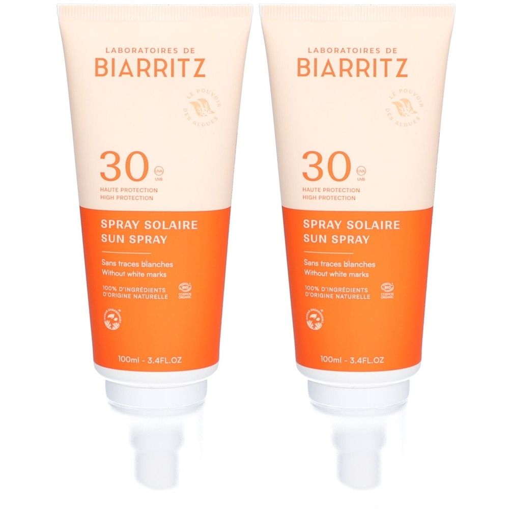 Deux tubes de spray solaire. Inscription: LABORATOIRES DE BIARRITZ, SPF 30, Spray Solaire, sans traces blanches. 100% ingrédients d'origine naturelle.