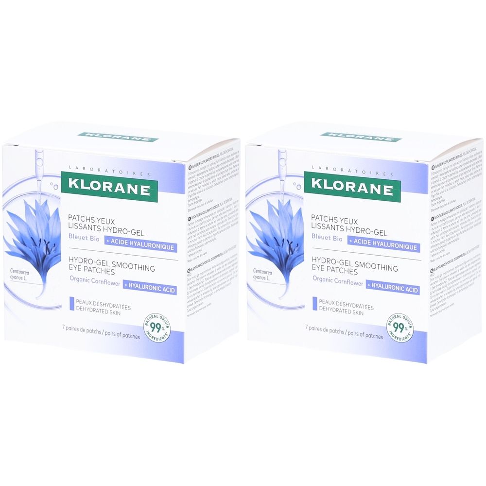 Deux boîtes de KLORANE Patchs Yeux Lissants Hydro-Gel. Inscription: HYDRO-GEL SMOOTHING EYE PATCHES. Fleur bleue. 99% d'ingrédients d'origine naturelle.