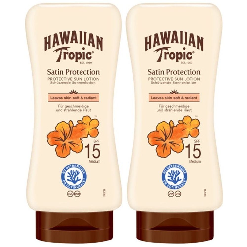 Deux flacons de lotion solaire. Inscription: HAWAIIAN Tropic, Satin Protection, SPF 15. Illustration florale.