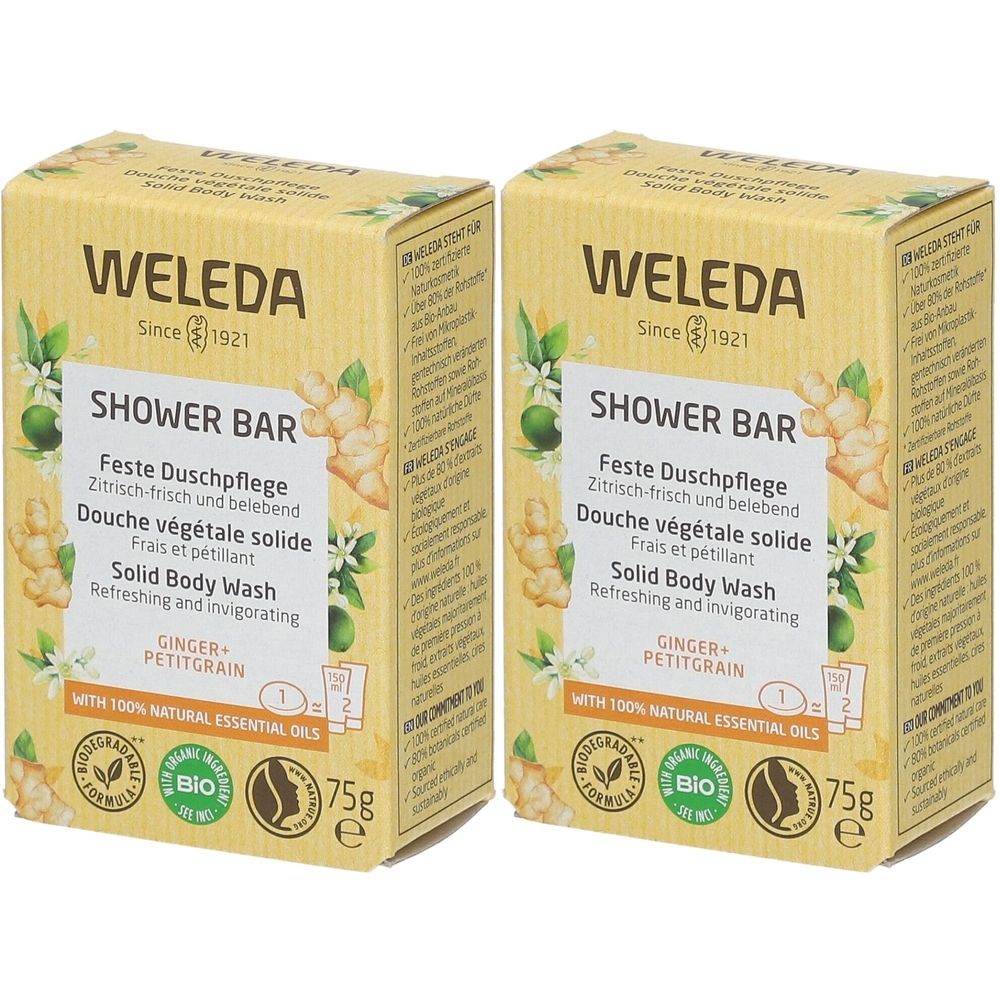 Deux boîtes rectangulaires "WELEDA SHOWER BAR". Certifications bio et informations produit multilingues.