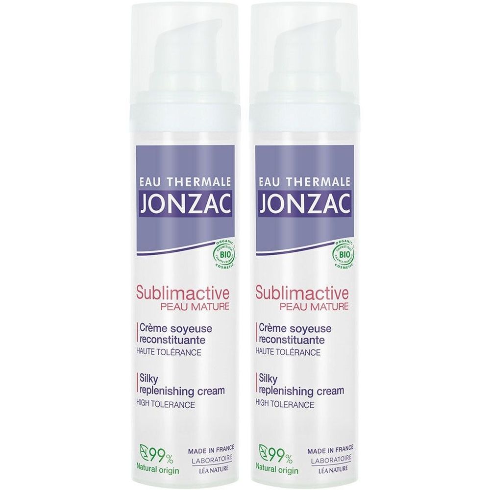 Deux flacons de crème Jonzac Sublimactive. Flacon blanc avec étiquette violette. Texte : Eau Thermale, Sublimactive, Crème soyeuse, Silky replenishing cream.