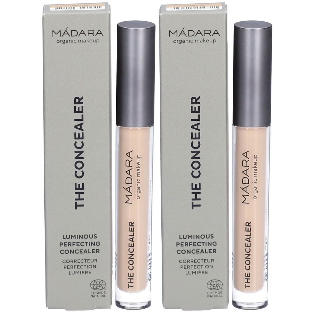Deux tubes de correcteur et leurs emballages. Sur les emballages, on lit "MÁDARA organic makeup" et "THE CONCEALER". Les tubes sont beige clair.