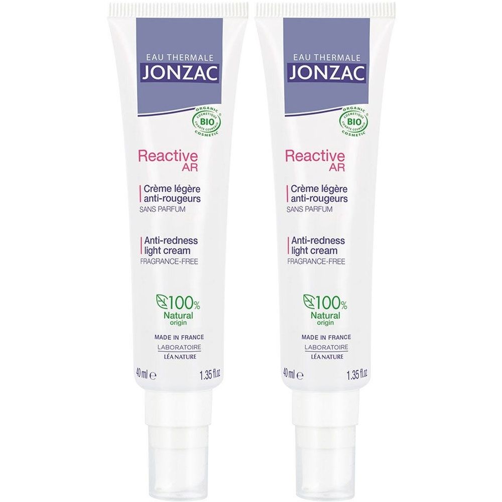 Deux tubes de crème Jonzac. Blancs, avec des accents violets et verts. Texte: Reactive AR, anti-rougeurs, crème légère, sans parfum, 100% origine naturelle.