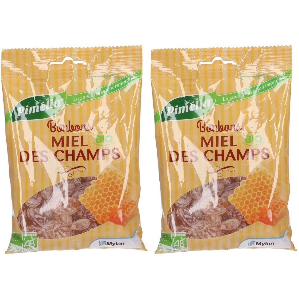 Deux sachets de bonbons Miel des Champs. Emballage jaune avec illustration de rayon de miel. Inscriptions: Pimélia Bio, label AB, Mylan.