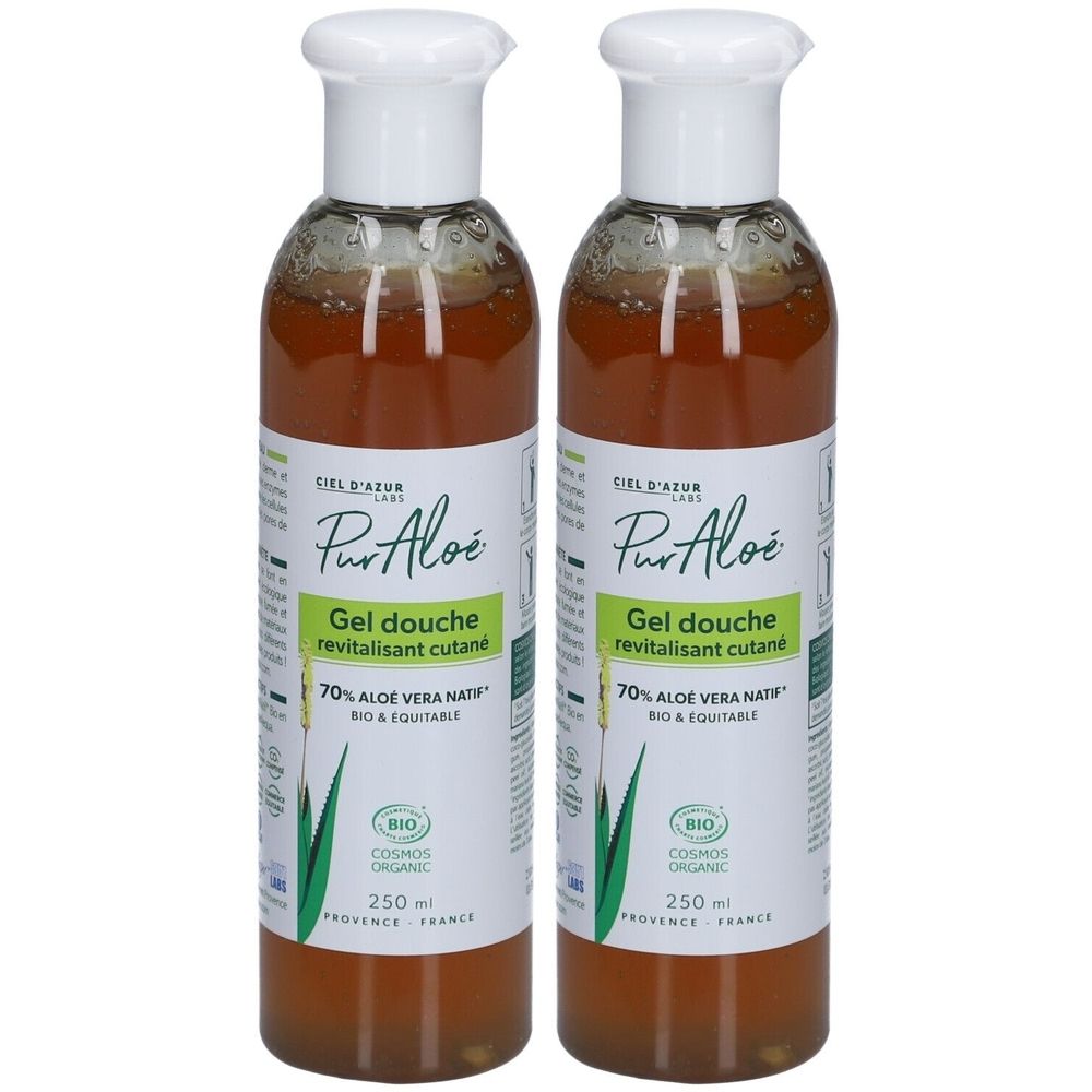 Deux flacons de gel douche avec bouchons blancs et étiquettes. L'étiquette indique "Pur Aloé Gel douche revitalisant cutané".