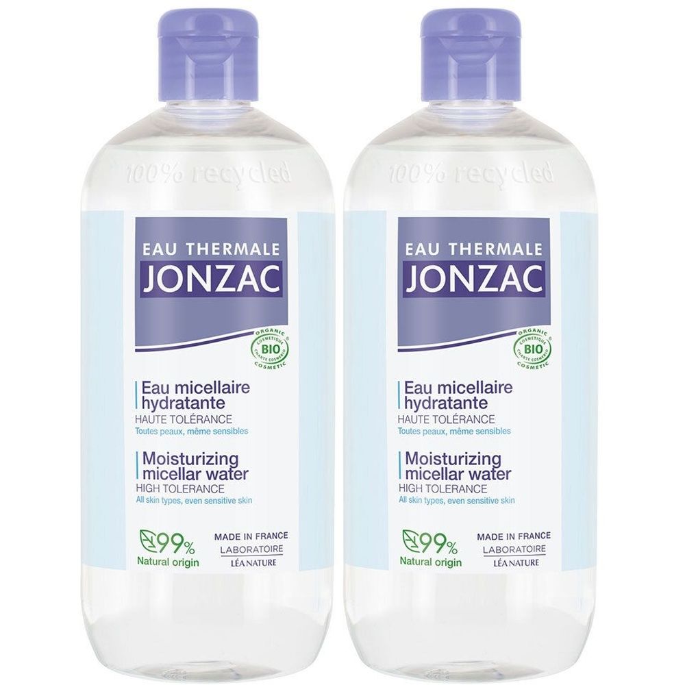 Deux flacons d'Eau Micellaire Hydratante Bio Jonzac. Liquide clair dans des bouteilles transparentes avec bouchons violets. Texte: Eau Thermale Jonzac.