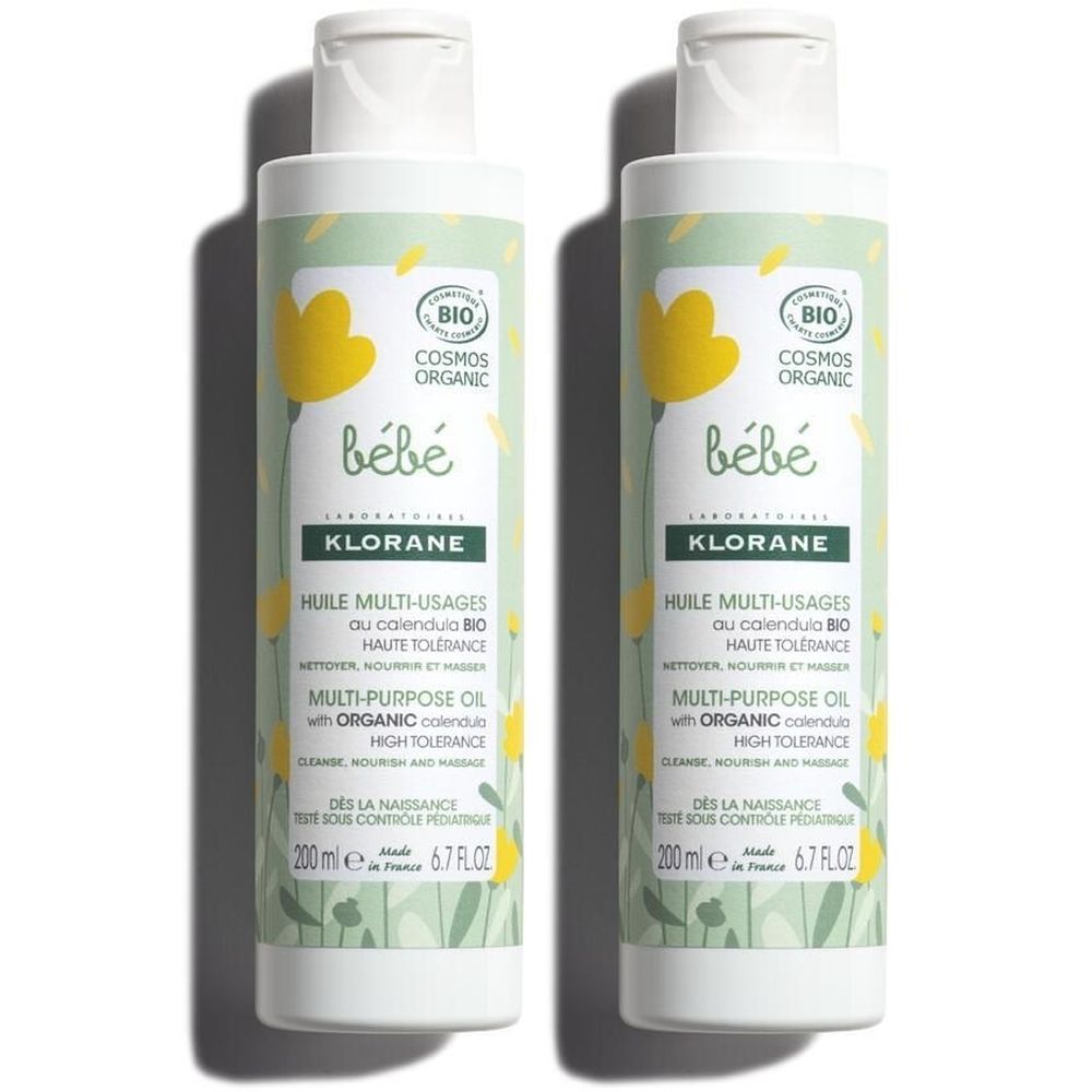 Deux flacons d'huile pour bébé. Corps blanc, étiquette jaune. Inscriptions : « bébé », « KLORANE », « Huile multi-usages ». Certification bio.