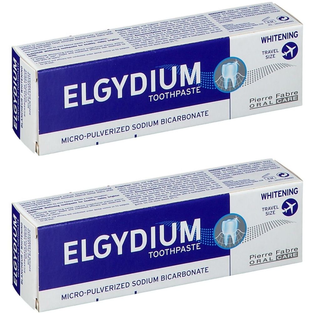 Deux boîtes de dentifrice Elgydium. Emballage bleu avec texte blanc. Inscription : Whitening, Travel Size. Pierre Fabre Oral Care.