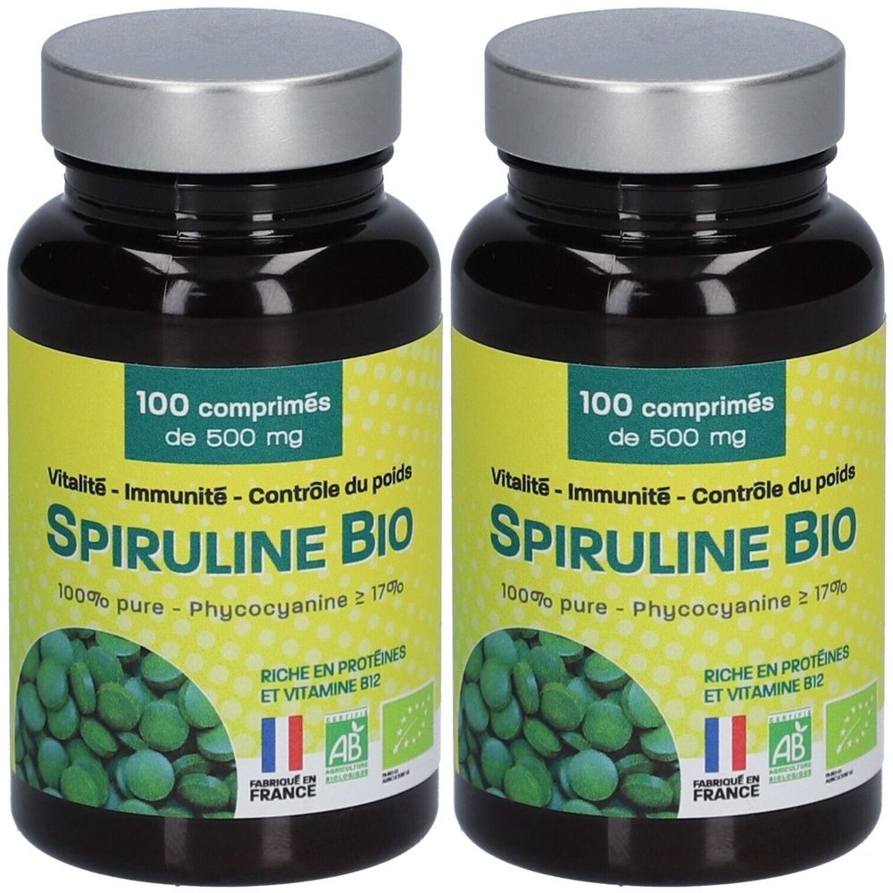 Deux flacons de Spiruline Bio. Chaque flacon contient 100 comprimés. Inscription: Vitalité, Immunité, Contrôle du poids. Avec label AB Bio.