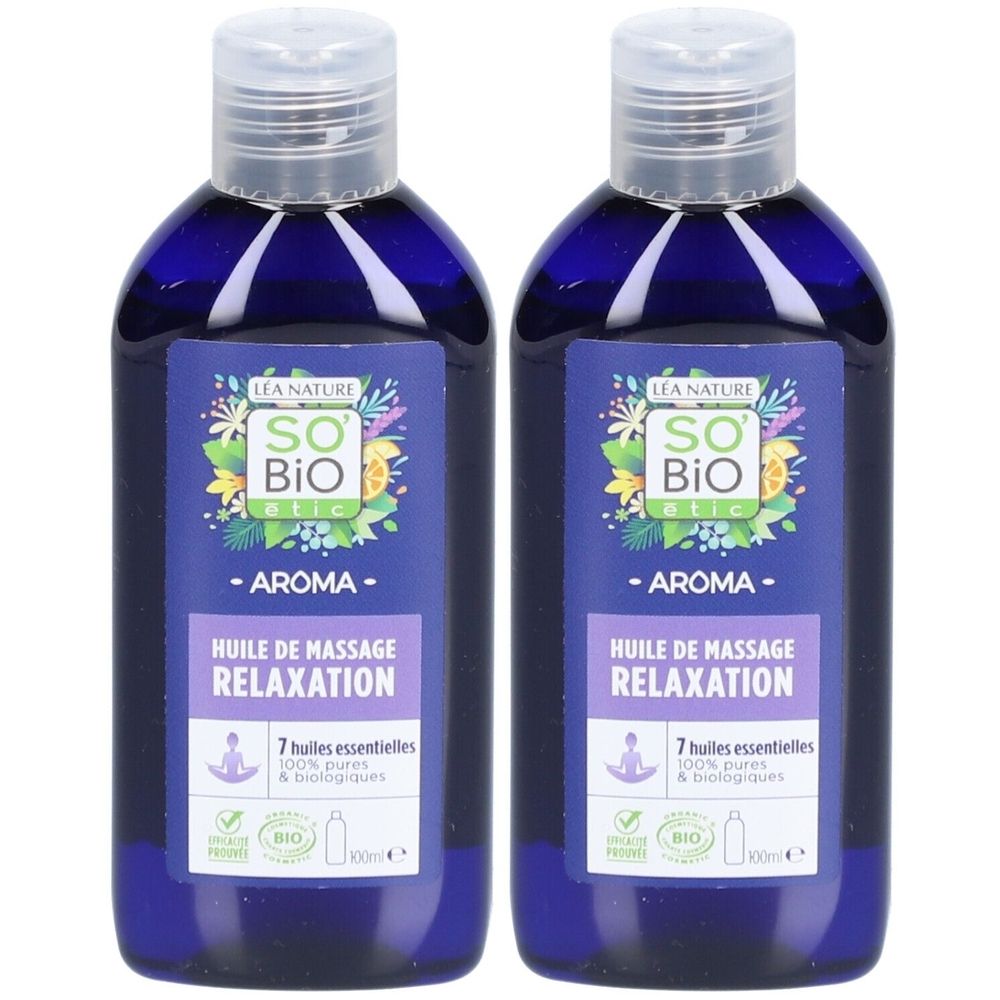 Deux flacons d'huile de massage SO BIO ETIC. Bouteilles en verre bleu avec bouchon blanc et étiquette. Inscription : Huile de Massage Relaxation.