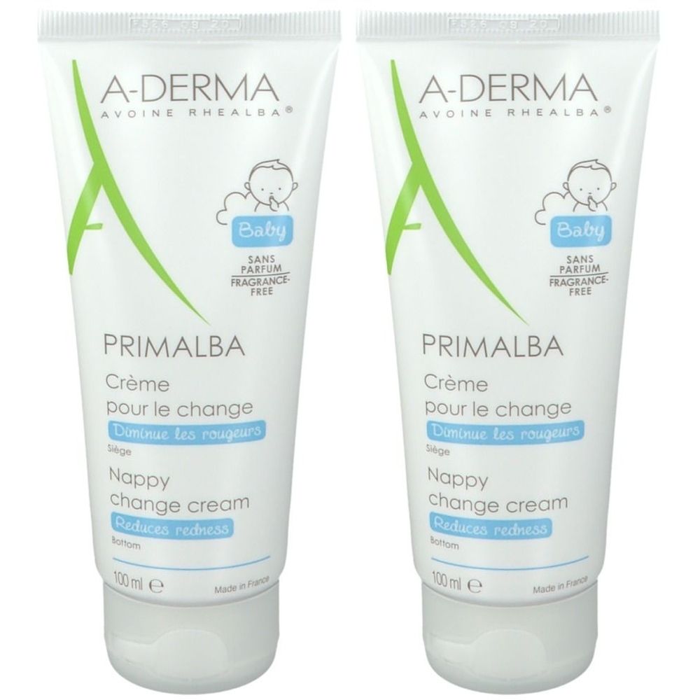 Deux tubes de crème pour le change A-DERMA Primalba Baby. Tubes blancs avec accents verts et inscriptions. Symbole bébé visible.