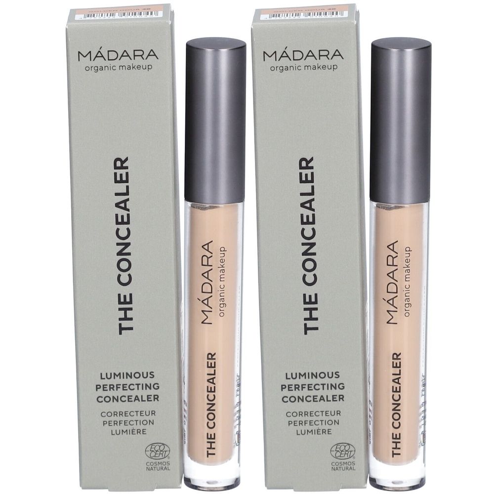 Deux tubes de correcteur et leurs emballages. Sur les emballages, on lit "THE CONCEALER" et "Mádara organic makeup".