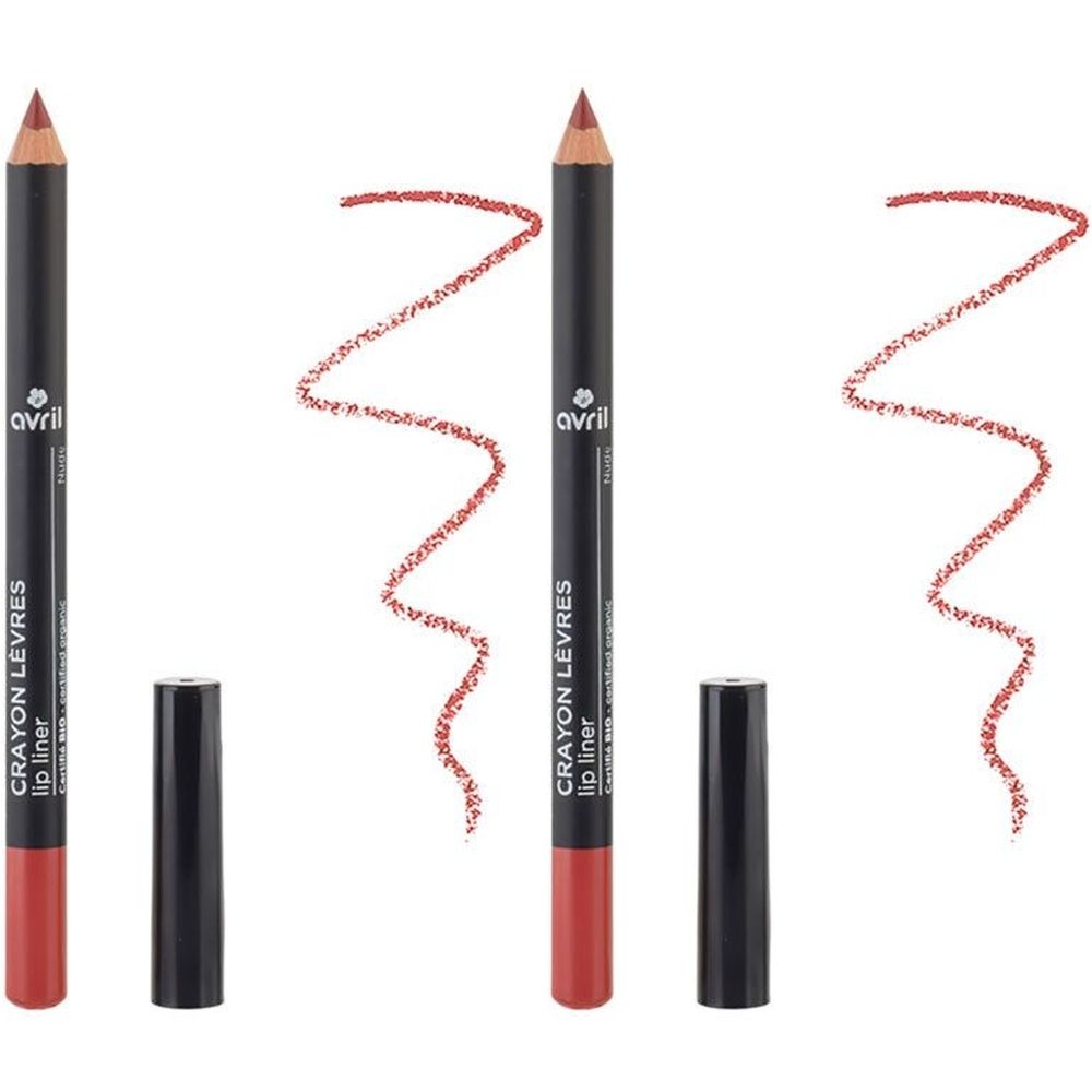 Trois crayons à lèvres nude avec corps noir et pointe rouge. Les capuchons sont retirés. Traits rouges à côté.