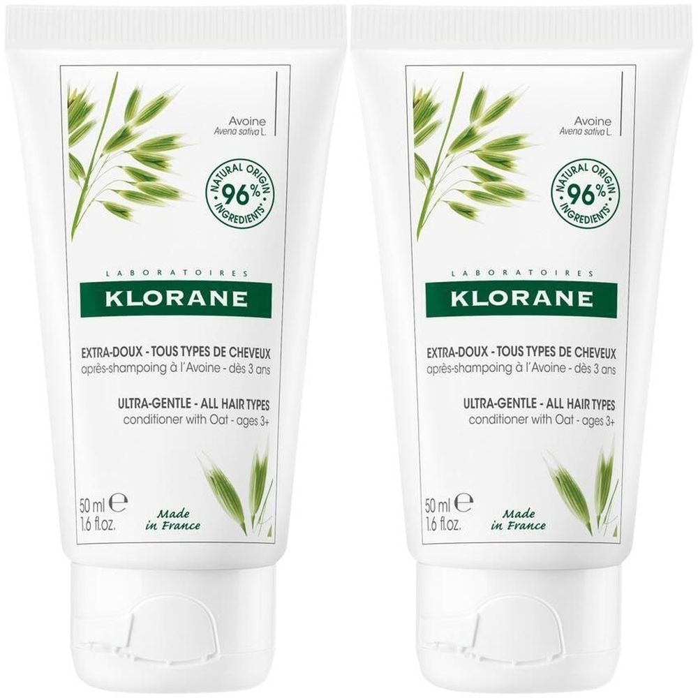 Deux tubes blancs de KLORANE® Après-shampoing Extra-Doux à l'Avoine. Ingrédients naturels à 96%. Contient de l'avoine. Fabriqué en France.