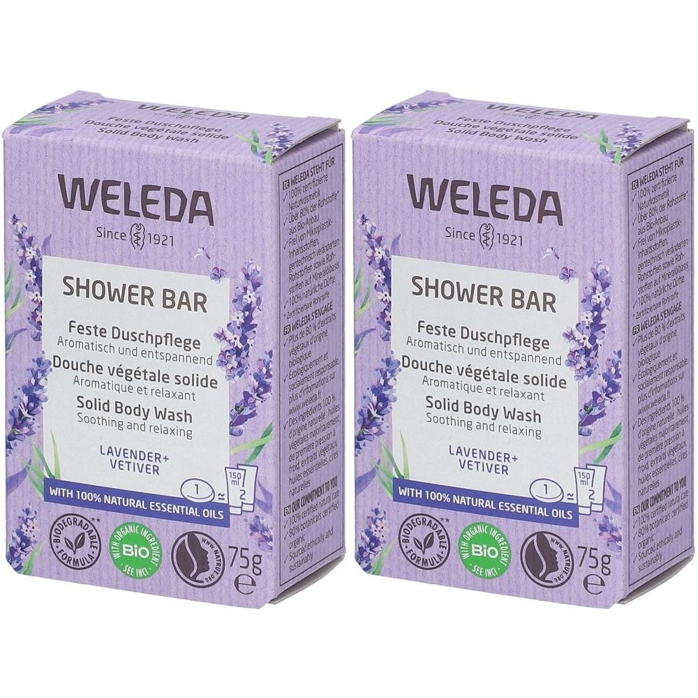 Deux boîtes rectangulaires. Inscription : WELEDA, SHOWER BAR, Douche végétale solide, Solid Body Wash. Motif lavande et vétiver.