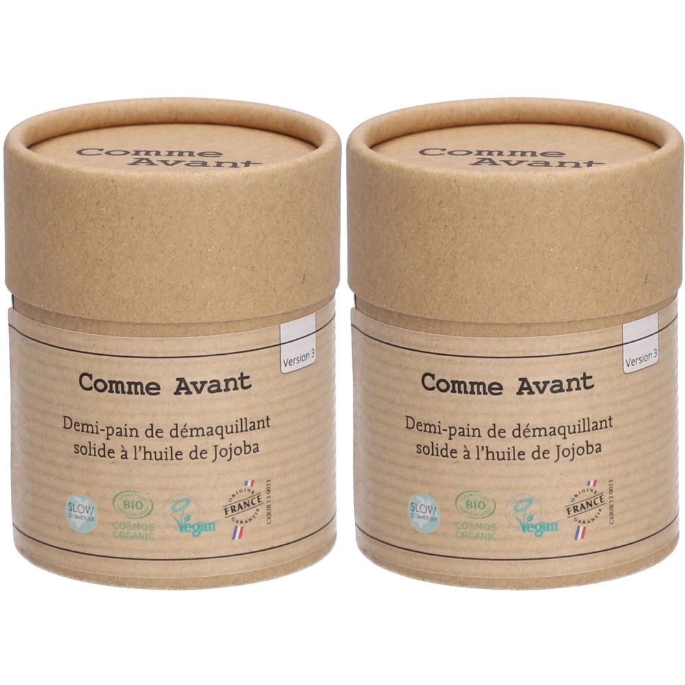 Deux boîtes cylindriques en carton brun. Inscription: Comme Avant, Demi-pain de démaquillant solide à l'huile de Jojoba. Avec certifications.