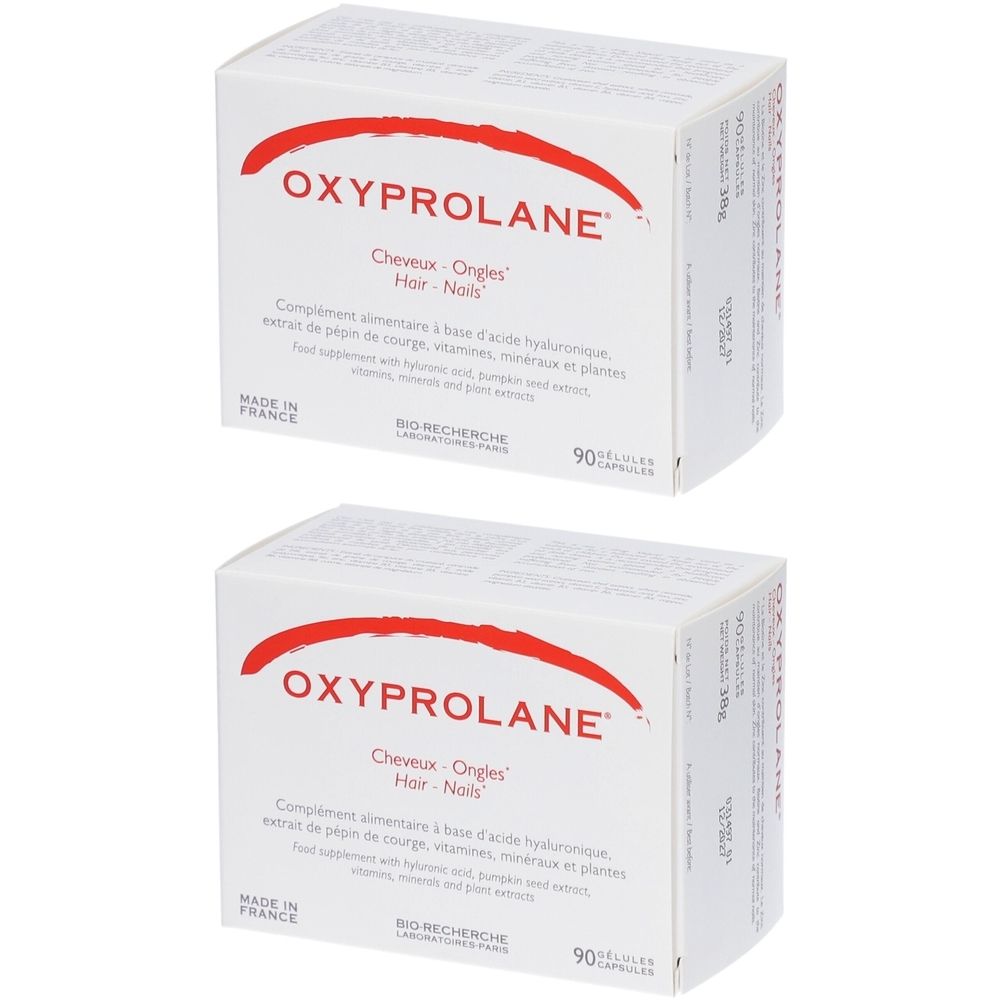 Deux boîtes blanches avec texte rouge OXYPROLANE. Texte: Cheveux - Ongles - Hair - Nails. 90 gélules. Fabriqué en France.