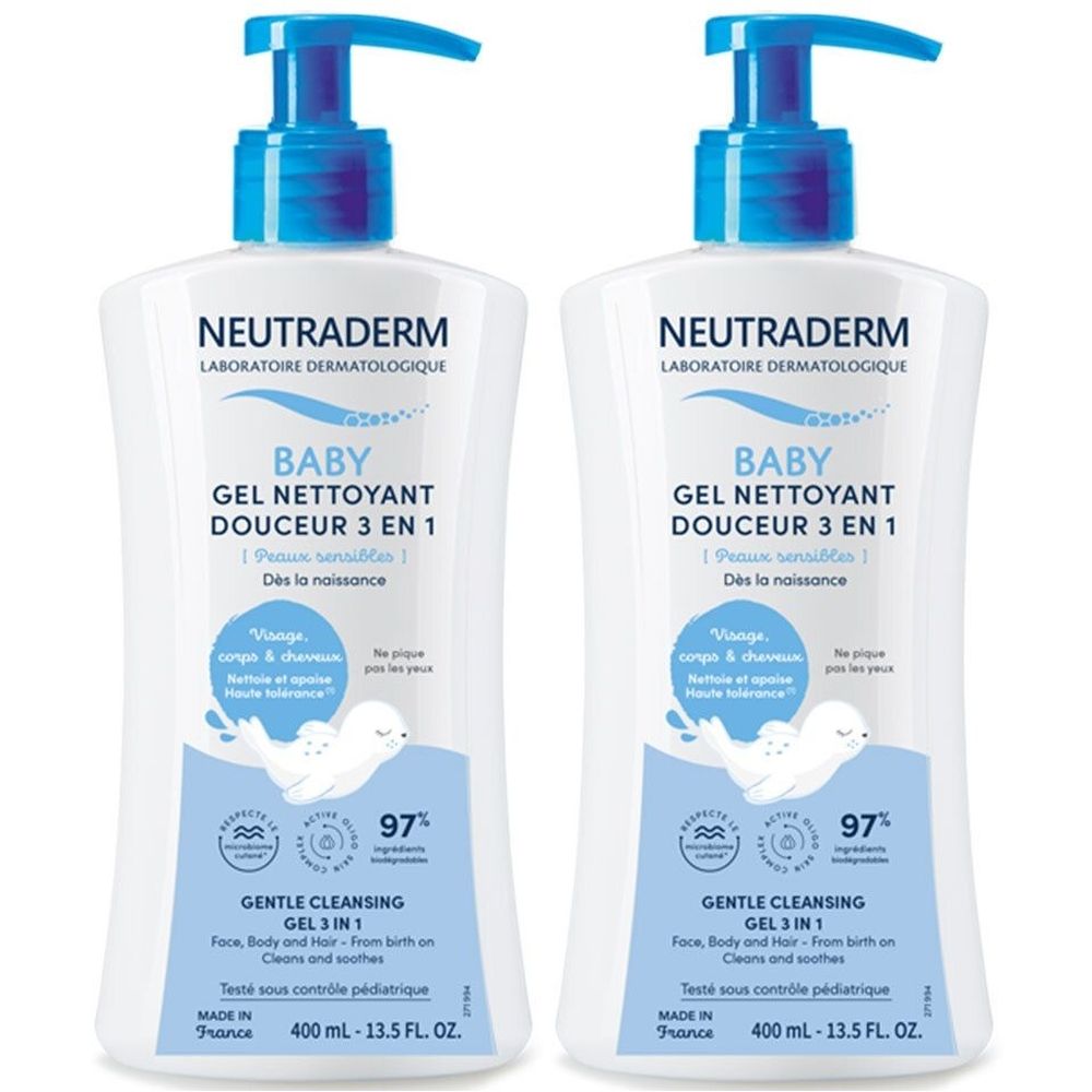 Deux flacons blancs avec pompe bleue. Inscription: Neutraderm Baby Gel Nettoyant Douceur 3 en 1. Pour visage, corps et cheveux.