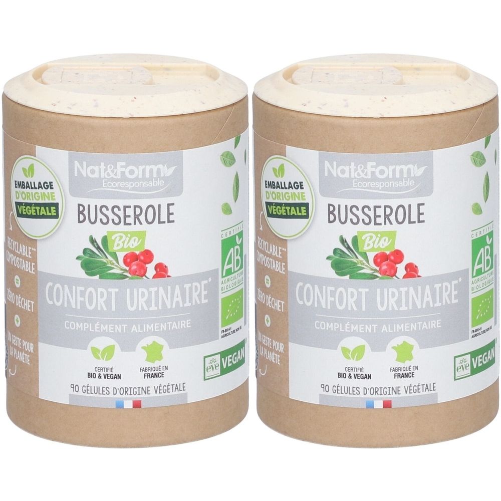 Deux boîtes cylindriques avec couvercles. Inscription : Busserole Bio, Confort Urinaire, complétée par des logos et du texte. Certification Vegan.