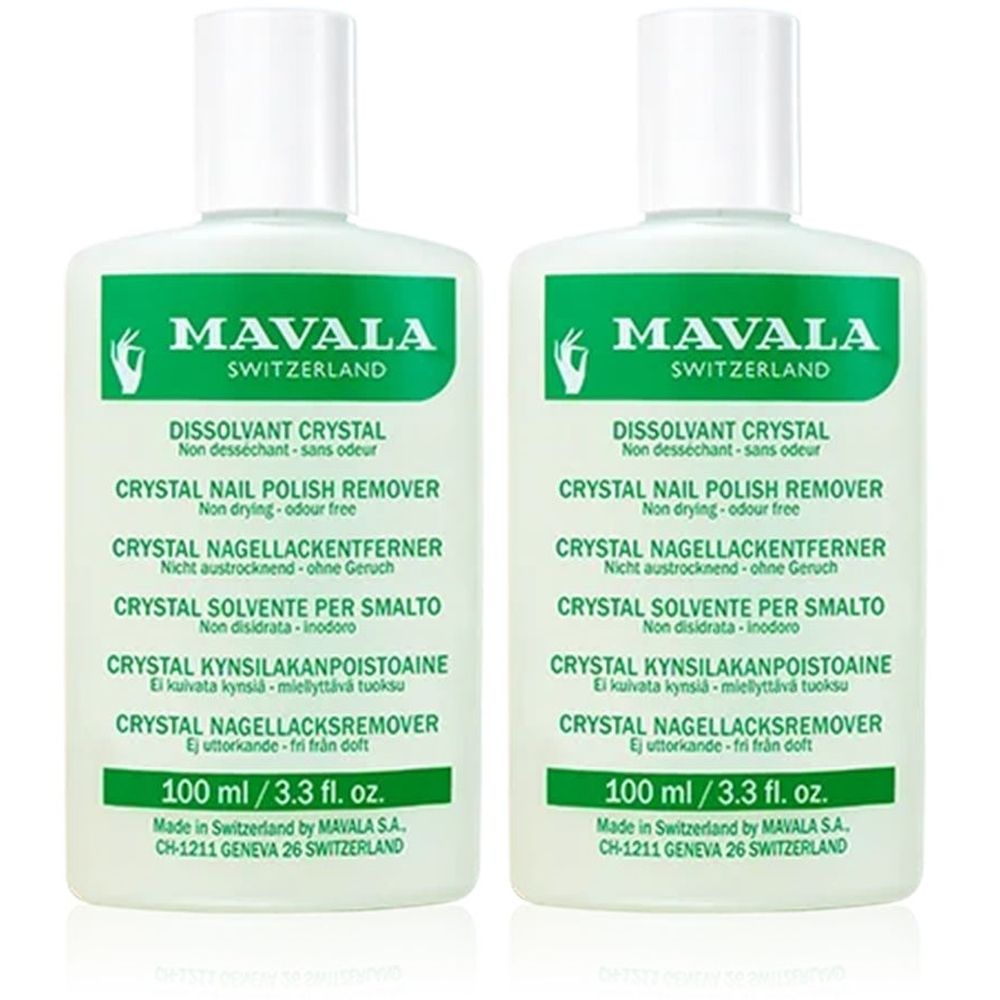 Deux flacons de dissolvant Mavala. Flacon blanc avec étiquette verte. Texte : Crystal Nail Polish Remover, 100 ml.