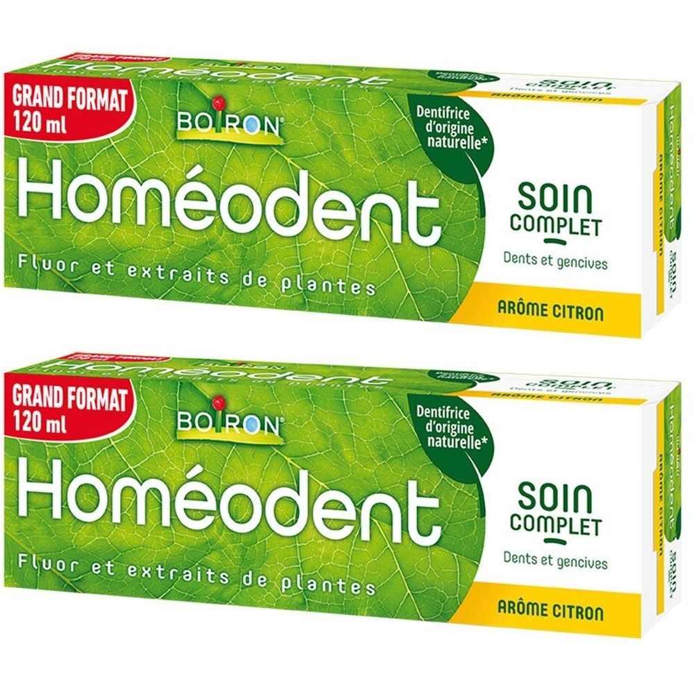 Deux boîtes de dentifrice Homéodent. Emballage vert et blanc avec nom et ingrédients. Inscription : Soin Complet, Arôme Citron.