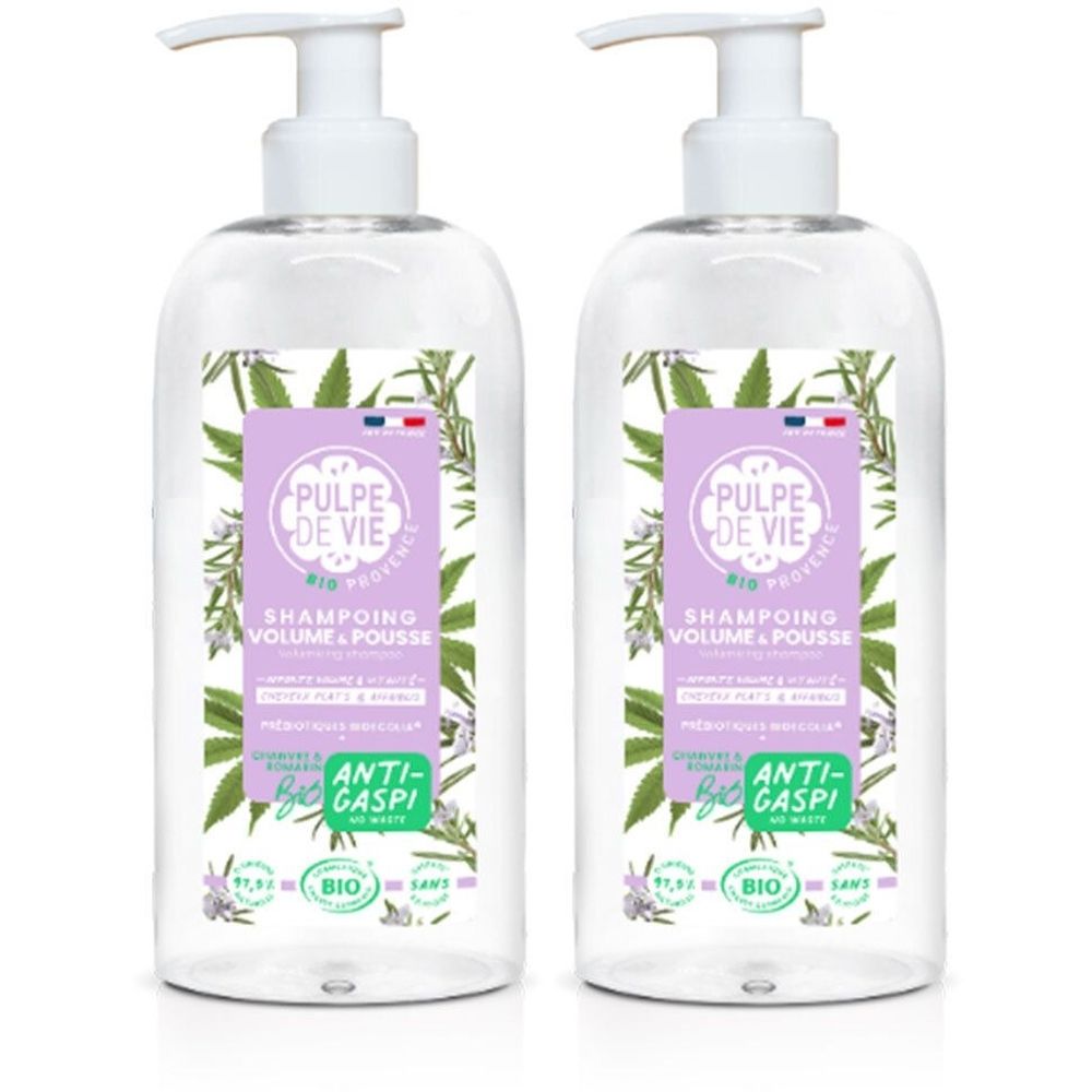 Deux flacons de shampooing transparents avec pompe blanche. Étiquettes avec texte et logo. Inscription: PULPE DE VIE, Shampooing Volume & Pousse.