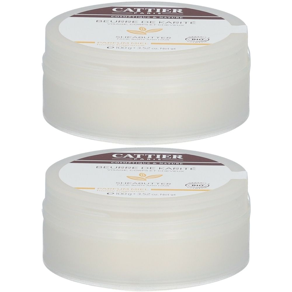 Deux pots de crème avec couvercles. Inscription: Cattier Paris, Beurre de Karité, Sheabutter. Certification bio.