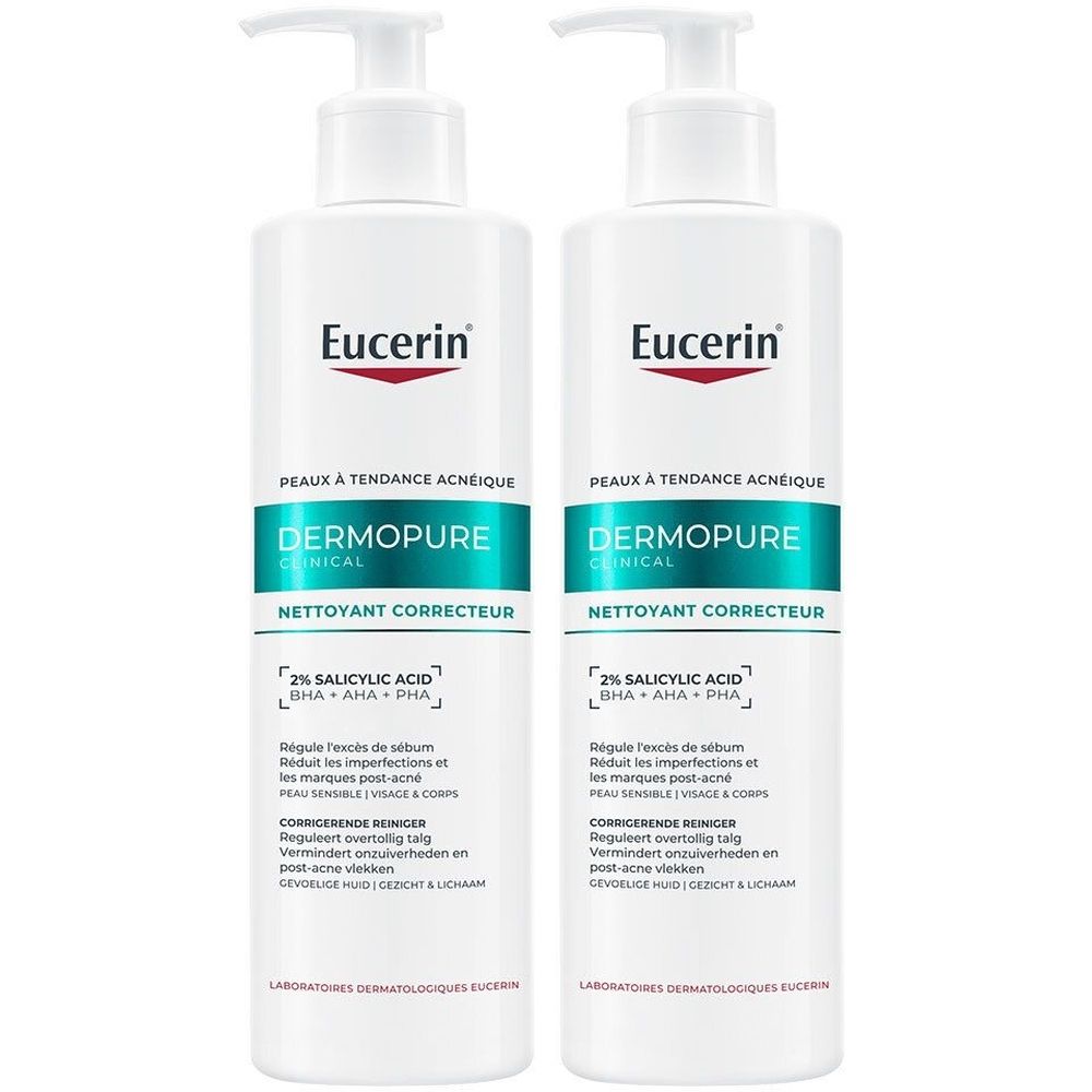 Deux flacons blancs avec pompe. Inscription Eucerin DermoPure. Texte en plusieurs langues.