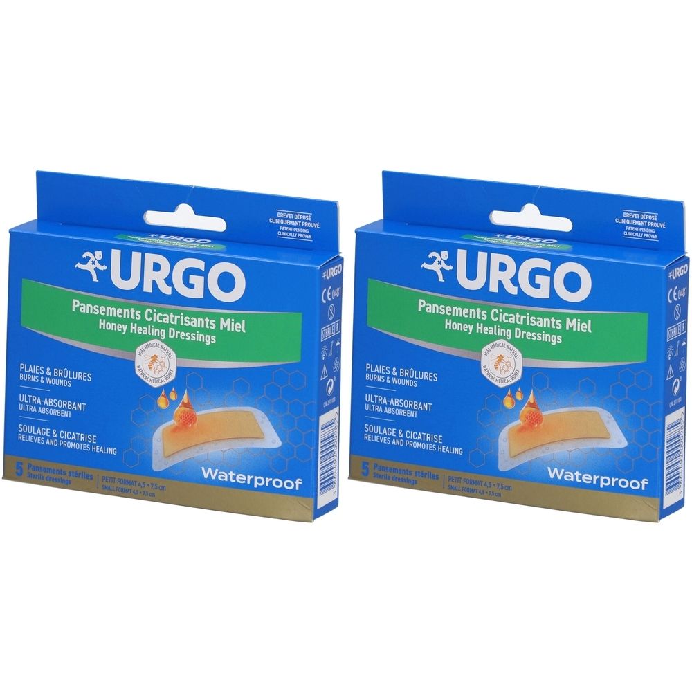 Deux boîtes bleues URGO. Inscription: Pansements Cicatrisants Miel, Honey Healing Dressings.  « Waterproof » est visible.