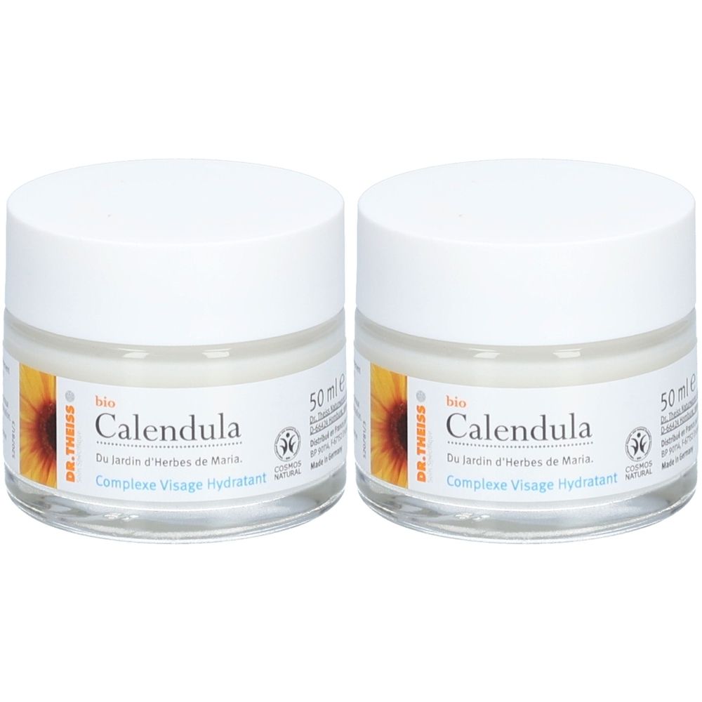 Deux pots de crème avec couvercles blancs. Étiquettes avec "Calendula" et "Complexe Visage Hydratant". Marque: DR. THEISS. 50 ml.