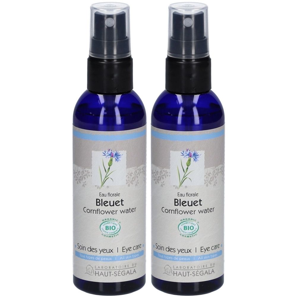 Deux flacons bleus avec vaporisateur. Inscription: Eau florale Bleuet Cornflower water, certification BIO, Soin des yeux. Laboratoire du Haut-Ségala.