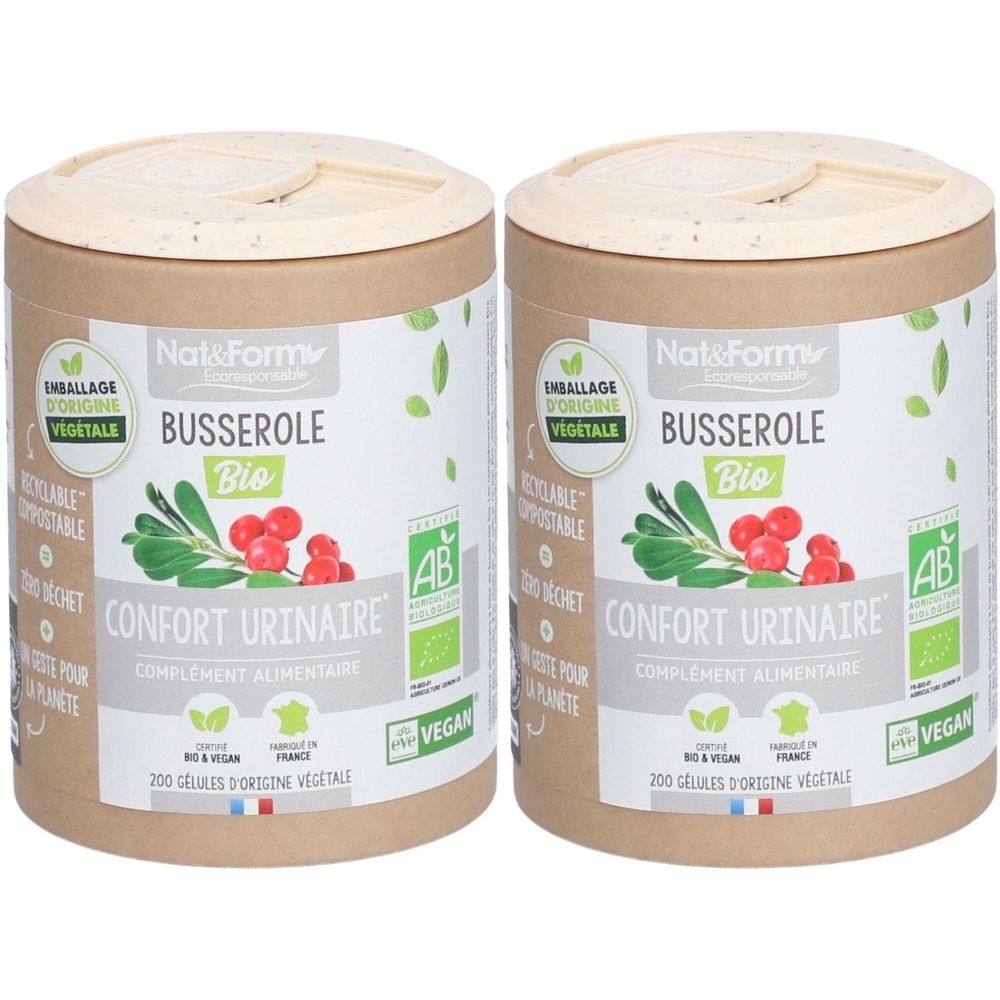 Deux boîtes cylindriques avec couvercles. Inscription: Busserole Bio, Confort Urinaire, complétée par des logos et du texte. Certification Vegan.