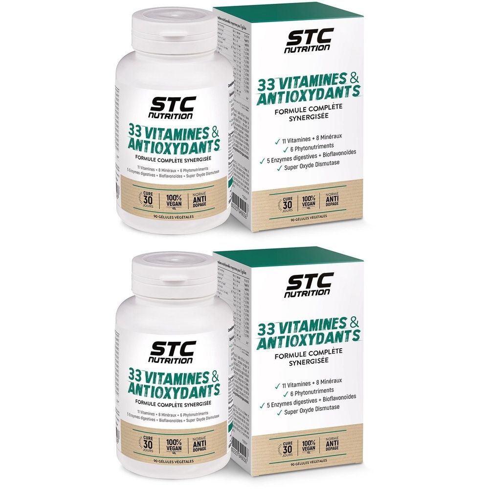 Deux flacons et boîtes de STC Nutrition 33 Vitamines & Antioxydants. Inscription: 30 capsules, 100% Vegan, Anti-dopage.