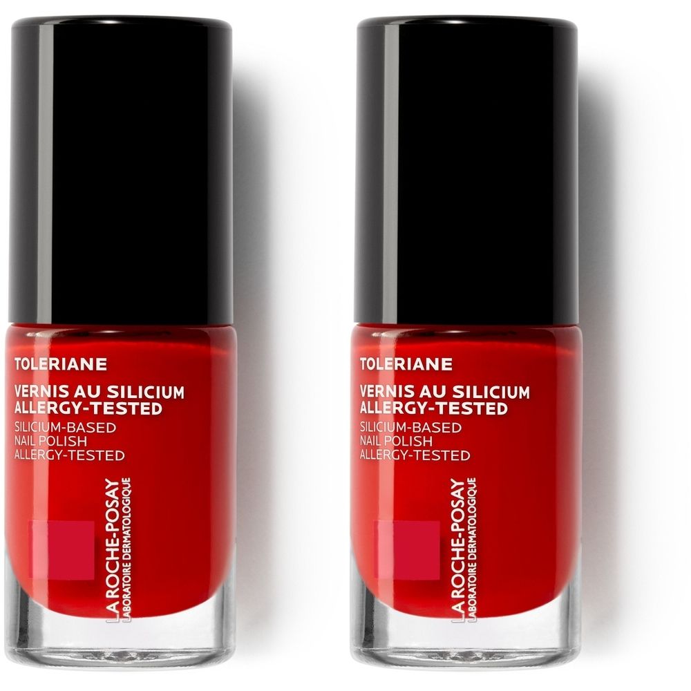 Deux flacons de vernis à ongles rouges avec bouchon noir. Inscription: Toleriane, Vernis au Silicium, Allergy-Tested. Marque: La Roche-Posay.