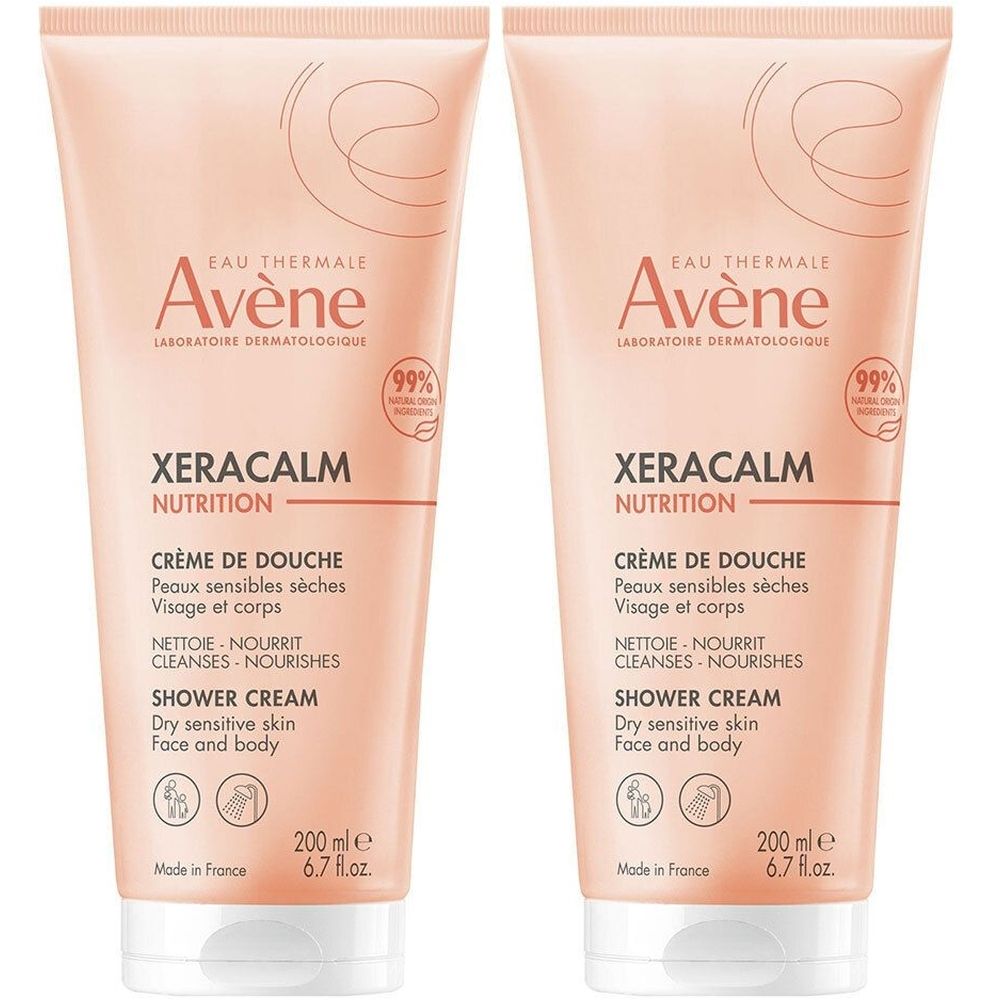 Deux tubes de crème de douche Avène XERACALM NUTRITION. Tubes roses avec texte blanc. Contient 99% d'ingrédients d'origine naturelle.