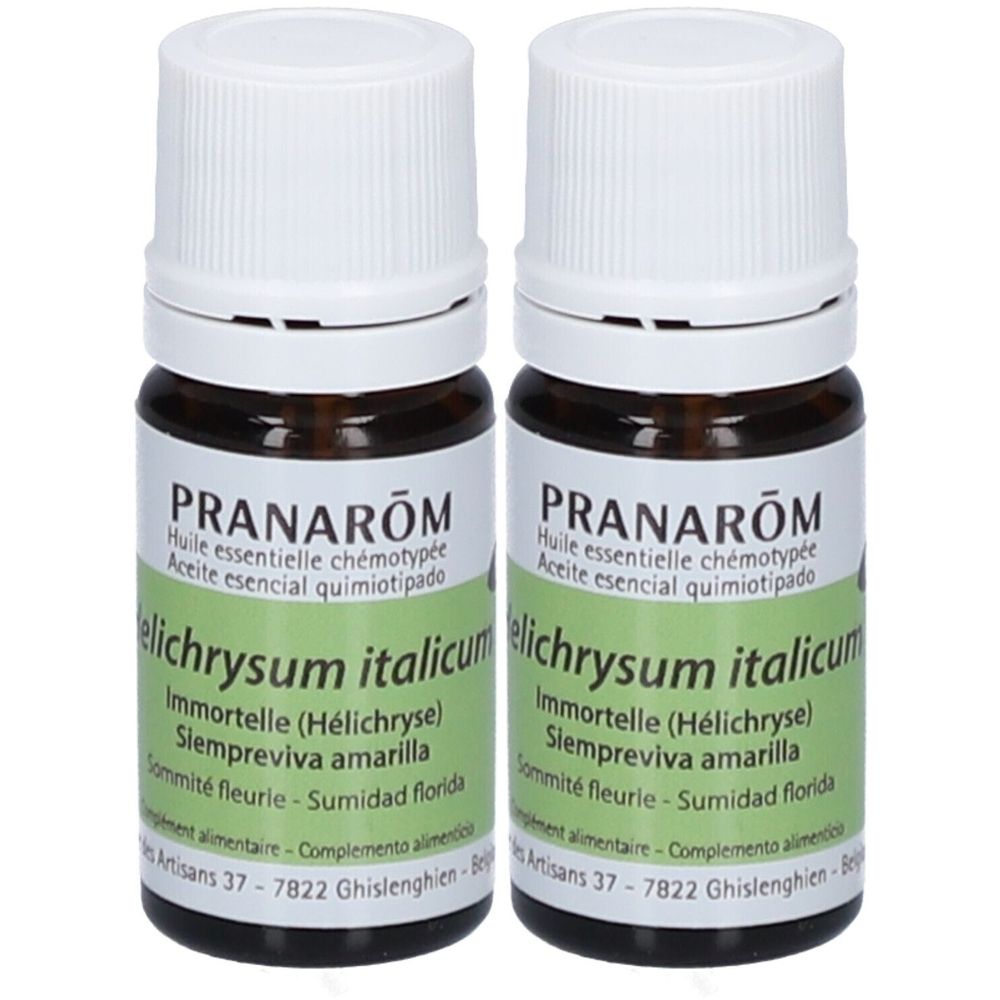 Deux flacons en verre brun avec bouchons blancs. Étiquettes avec "PRANAROM" et "Helichrysum italicum".