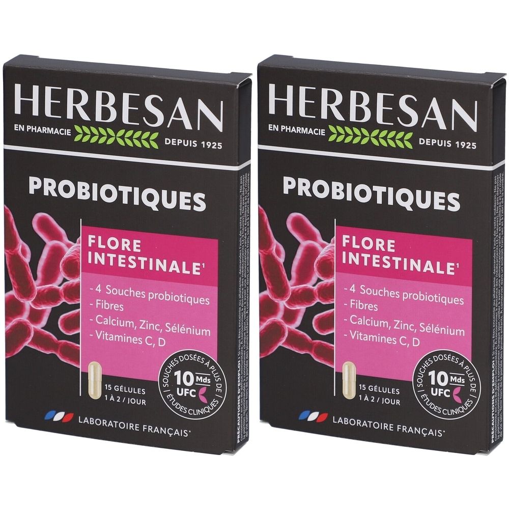 Deux boîtes de Herbesan Probiotiques. Emballage noir avec détails roses et informations produit. Contient des gélules.